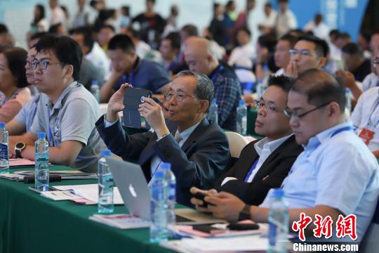 研討會現(xiàn)場圖?！■暮陚?攝